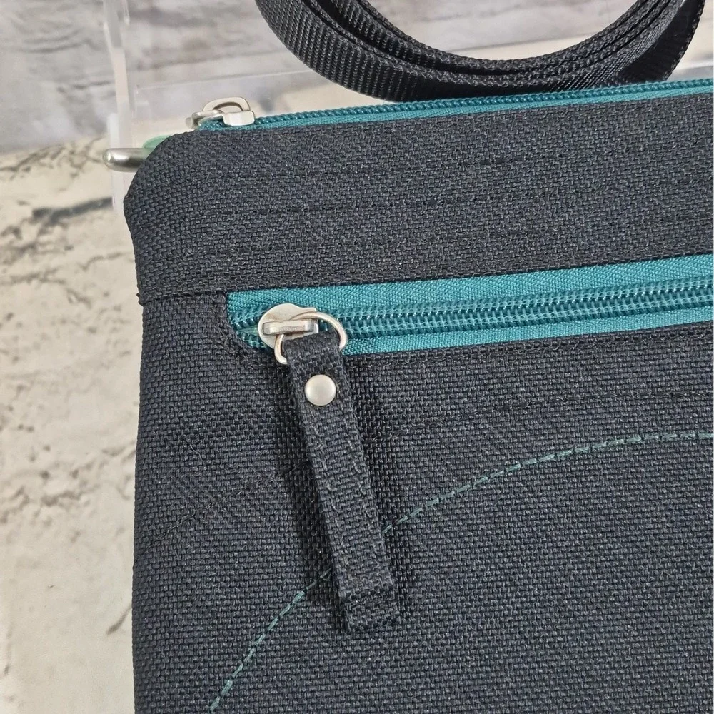 Haiku Impulse Crossbody Bag Black Green Multi-Pocket Travel Purse